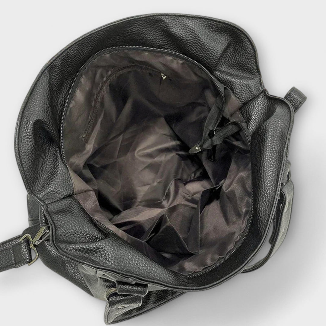 Sophisticated women's hobo bag, a stylish shoulder & crossbody option for various occasions.