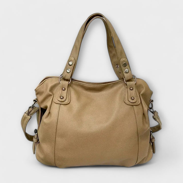 Chic women's hobo bag, elegant design with a comfortable shoulder strap, ideal for daily fashion.