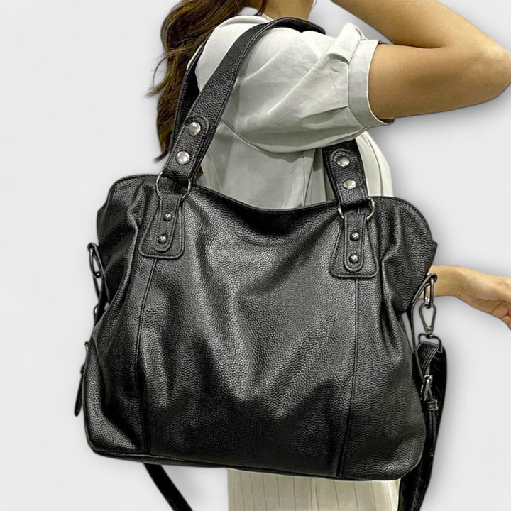 Stylish women's hobo bag, convertible shoulder & crossbody design, ideal for versatile daily carry.