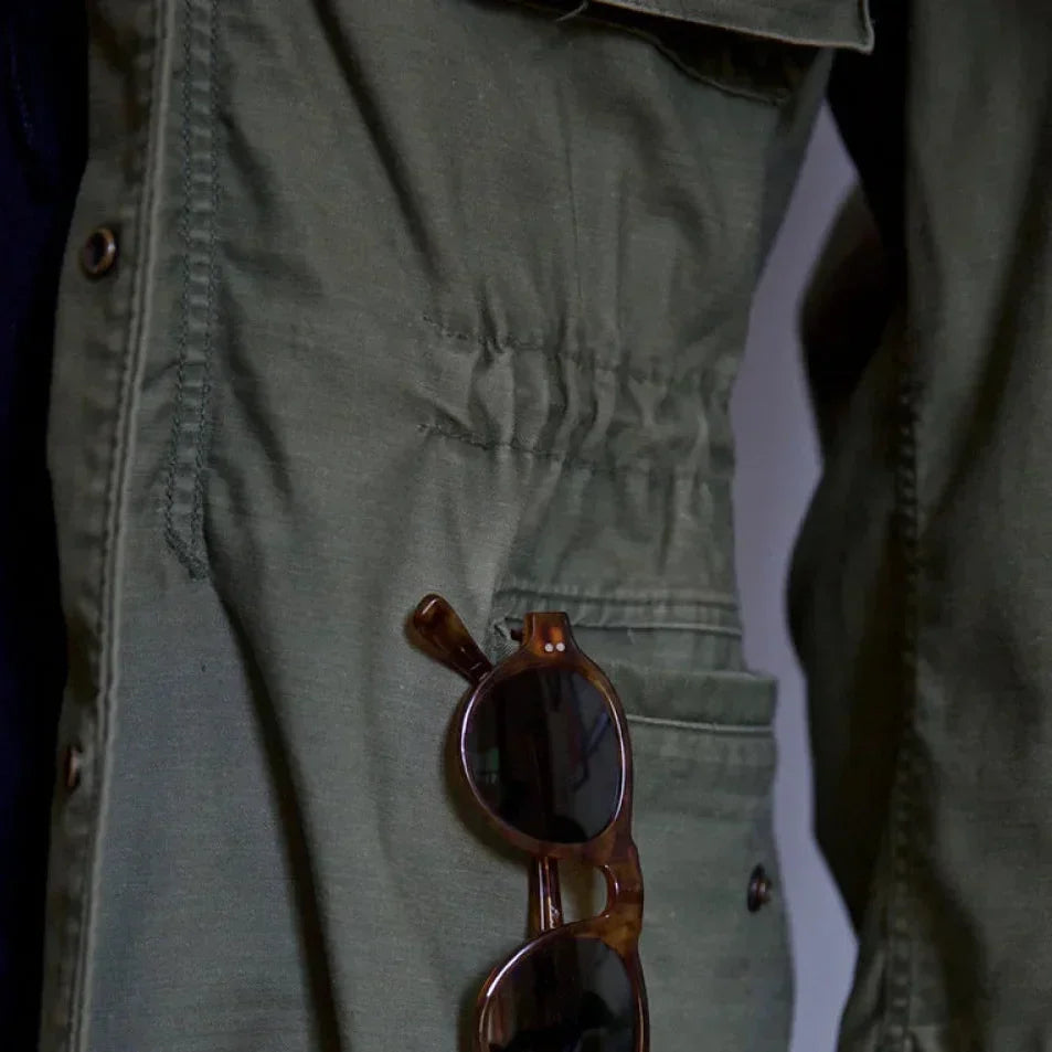 Men's adventure gear: multi-pocket utility long sleeve jacket with adjustable cuffs & waist.