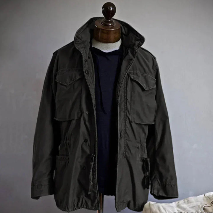 Rugged men's utility long sleeve jacket, multi-pocket, durable outerwear for outdoor adventure and casual wear.