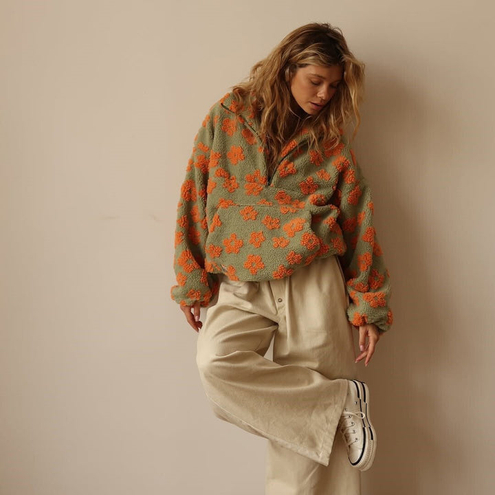Soft, warm women's oversized floral half-zip sweater jacket, a must-have for winter comfort.
