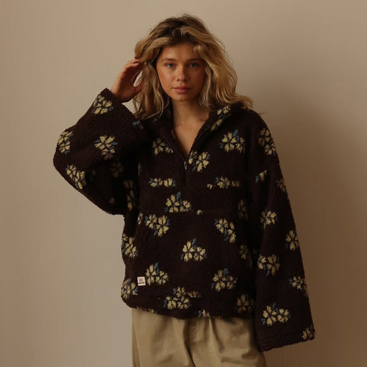 Versatile women's oversized floral half-zip sweater jacket, perfect for layering in fall & winter.