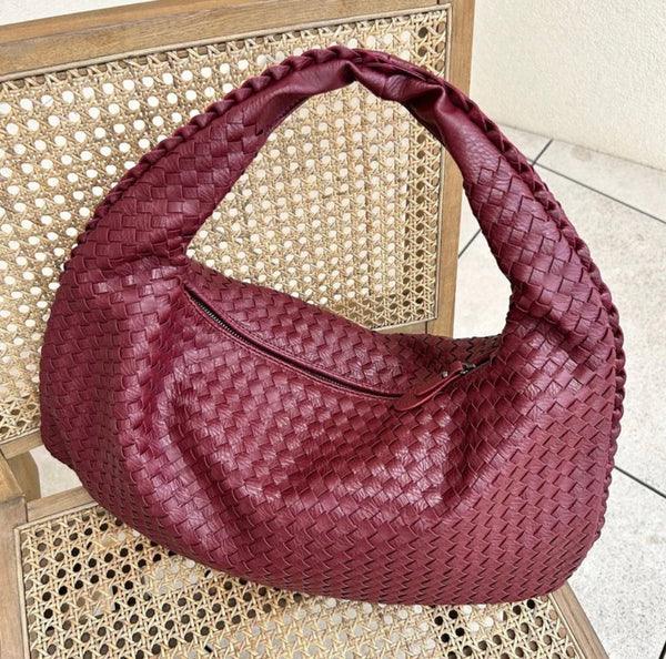 Women's slouchy woven shoulder bag in supple vegan leather, perfect everyday handbag.