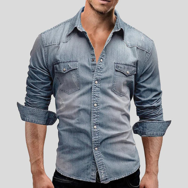 Men's classic slim fit long sleeve denim shirt in a versatile light wash, perfect for casual wear or an overshirt.