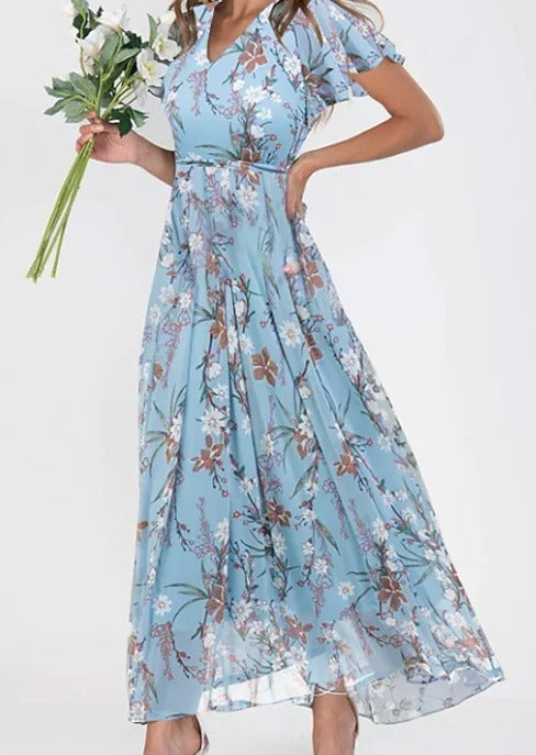 Feminine floral print midi dress for women, featuring elegant short sleeves. Versatile for day or evening.