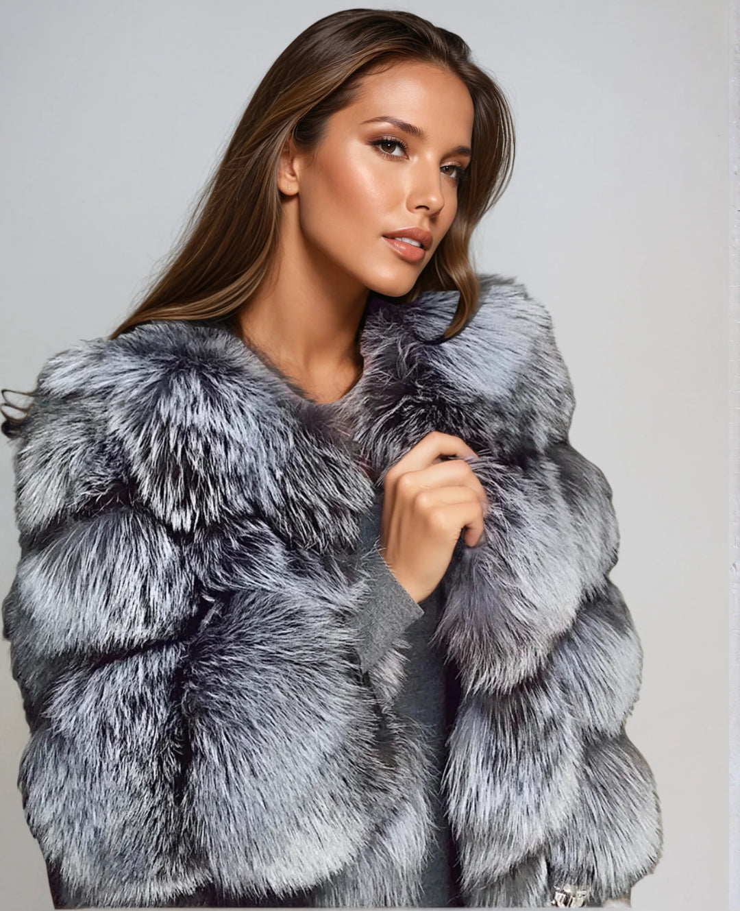 Chic women's voluminous winter jacket offering elegant style & ultimate warmth. Perfect cozy outerwear for ladies.