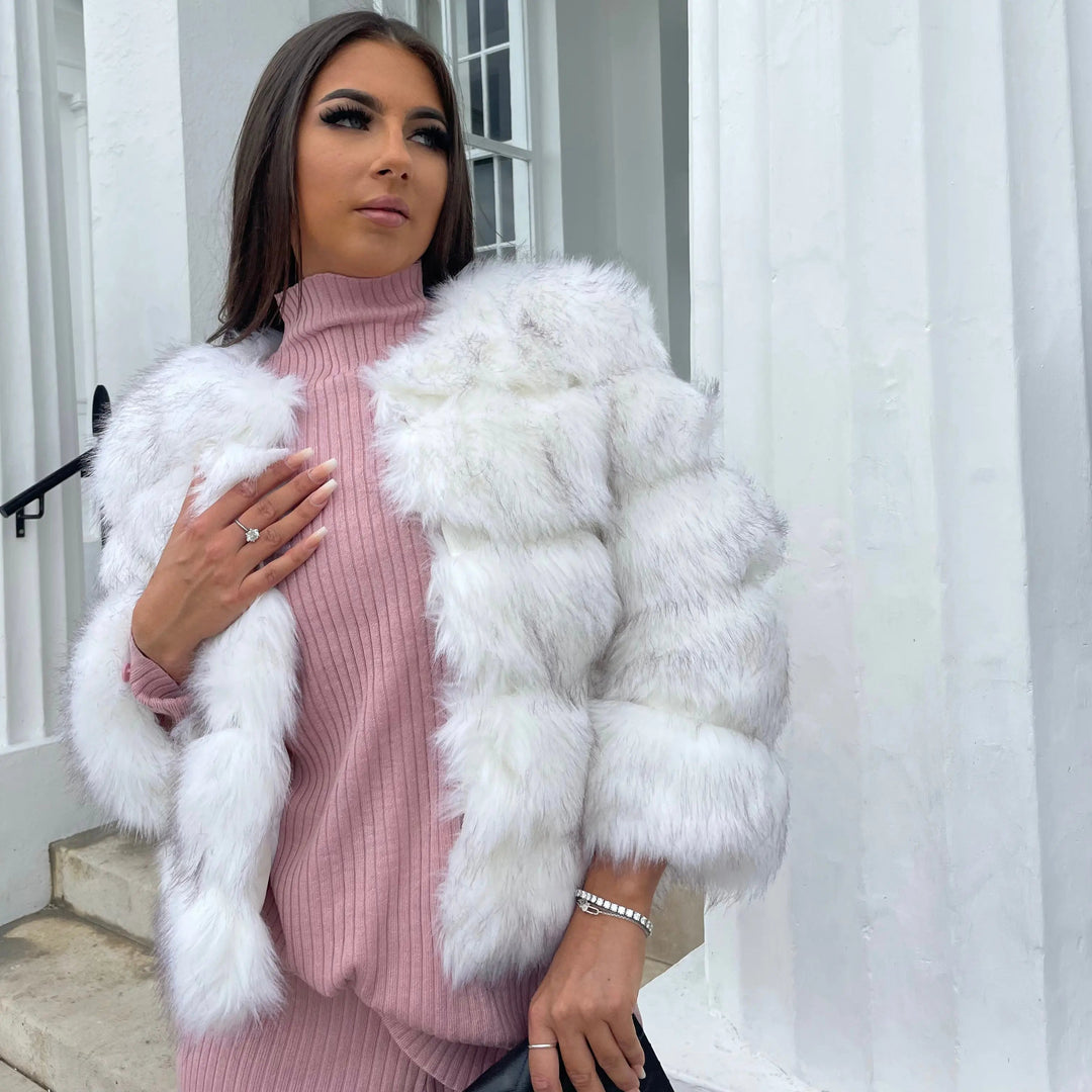 Cozy women's elegant winter coat, luxurious feel and stylish outerwear for ultimate comfort.