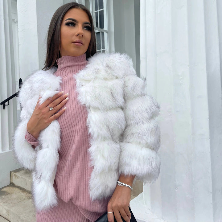 Cozy women's elegant winter coat, luxurious feel and stylish outerwear for ultimate comfort.