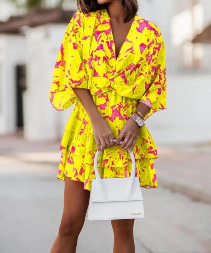 Lightweight bohemian floral mini dress for women, an essential for summer fashion and travel.
