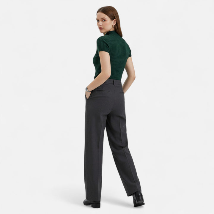 Stylish women's short-sleeve knitted turtleneck blouse, offering comfort & elegant design.