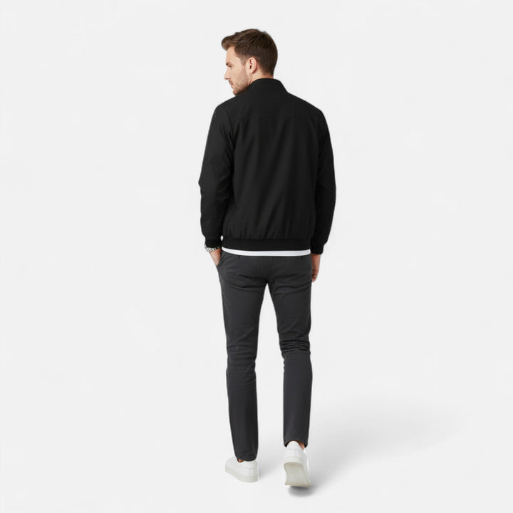 Stylish men's lightweight zip-up jacket for casual everyday wear, offering comfort for spring and fall outfits.