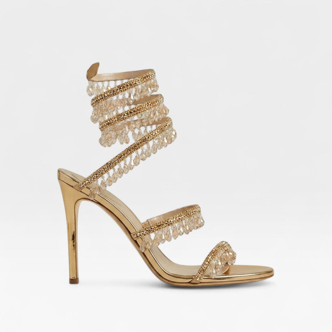Glamorous women's stiletto sandals with crystal straps, perfect for elegant formal wear.