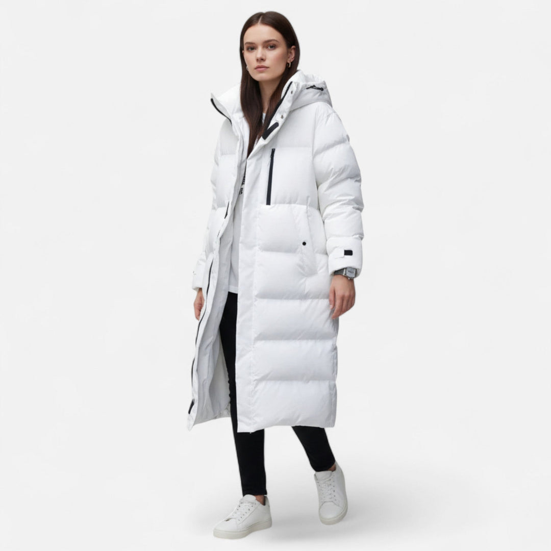 Cozy long puffer winter coat for women. Warm, chic, and stylish outerwear for cold weather fashion.
