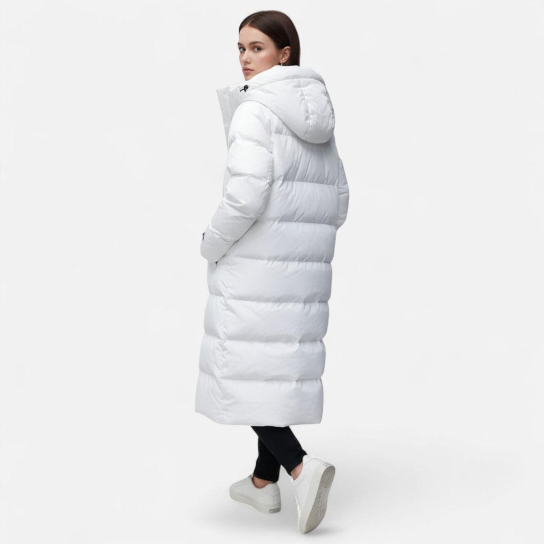 Weatherproof women's long puffer jacket, perfect elegant winter coat. Stylish & warm outerwear for ladies.