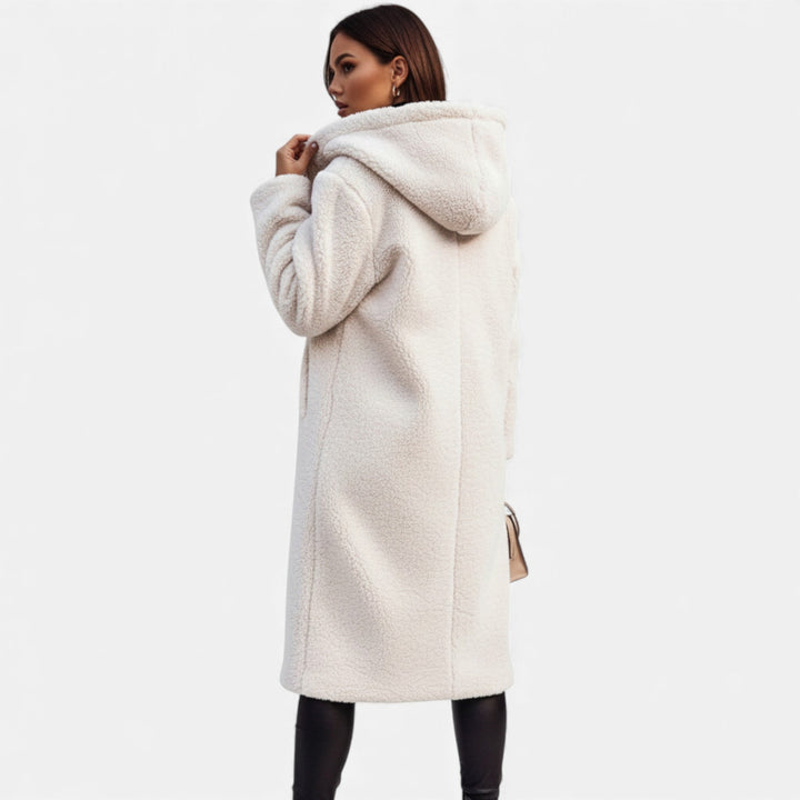 Fashionable women's plush winter coat, long and warm for elegant comfort.
