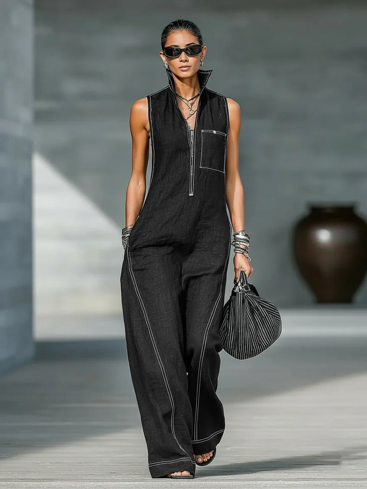 Chic sleeveless jumpsuit for women, featuring white trim; a comfortable and stylish travel outfit.