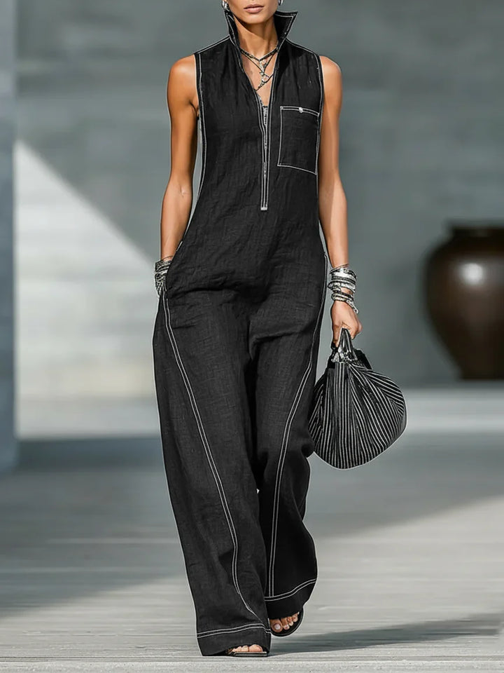 Women's sleeveless jumpsuit with chic white trim, offering a relaxed fit and elegant summer style.