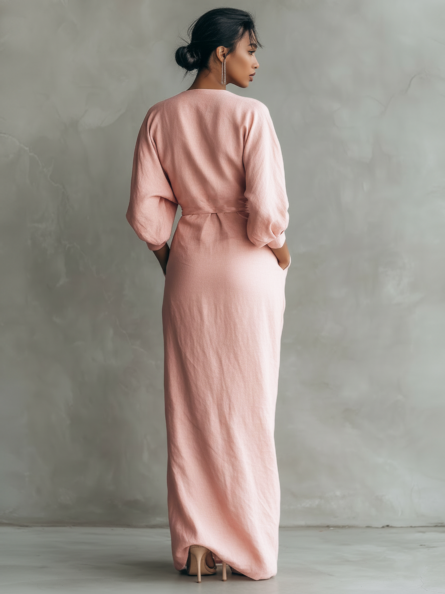 Elegant v-neck flowy maxi wrap dress for women, ideal for vacation or a chic summer look.