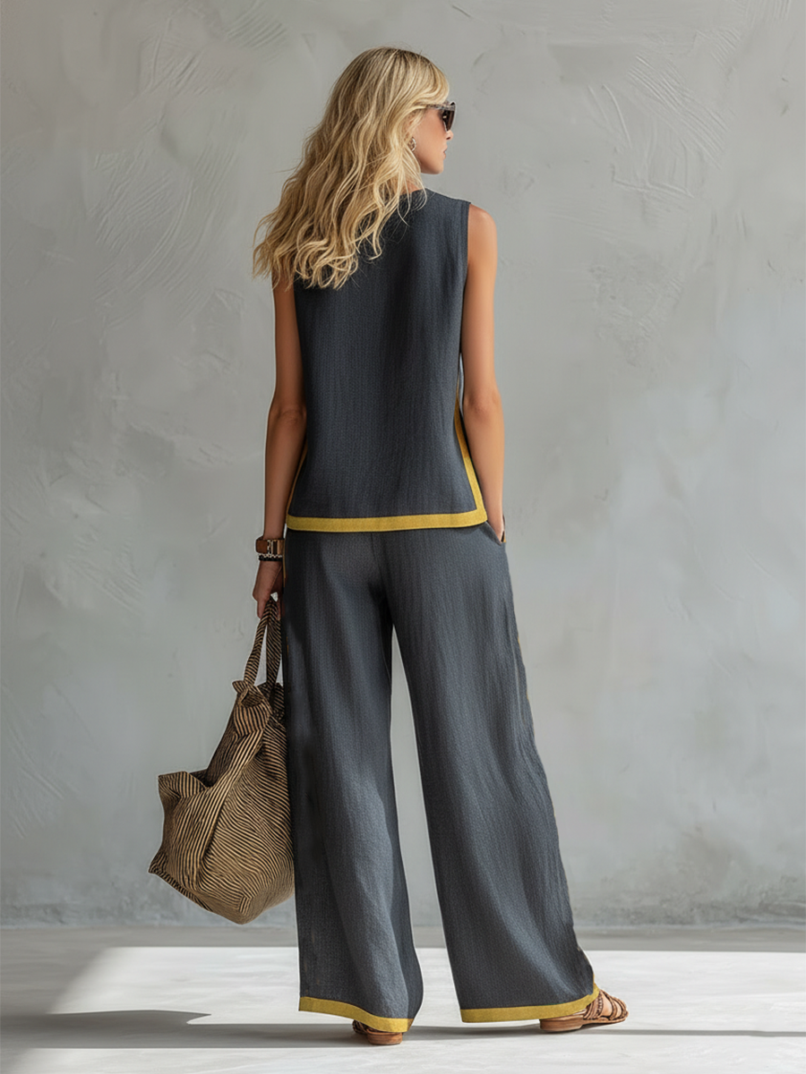 Versatile two-piece women's sleeveless top & wide leg trouser set. Elegant for casual or everyday summer wear.