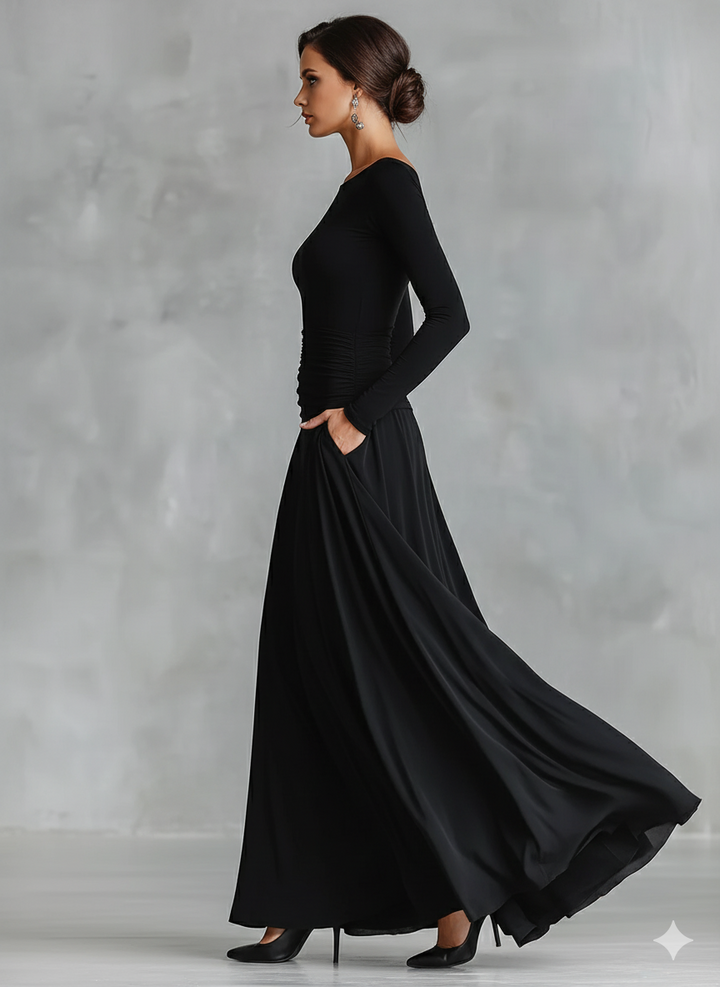Sophisticated black ruched maxi dress for women, featuring a boat neck & long, elegant silhouette. Timeless evening wear.