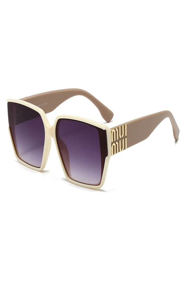 Classic women's oversized square sunglasses featuring elegant gold detail. Timeless fashion eyewear.