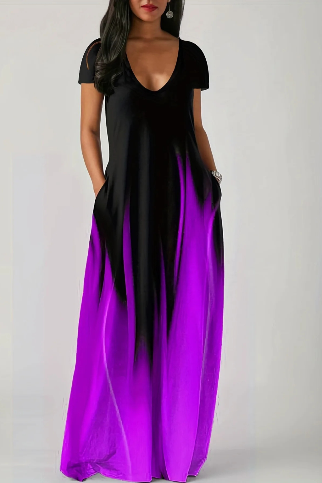 Woman in comfortable ombre V-neck short sleeve maxi dress, casually seated, perfect for summer style.