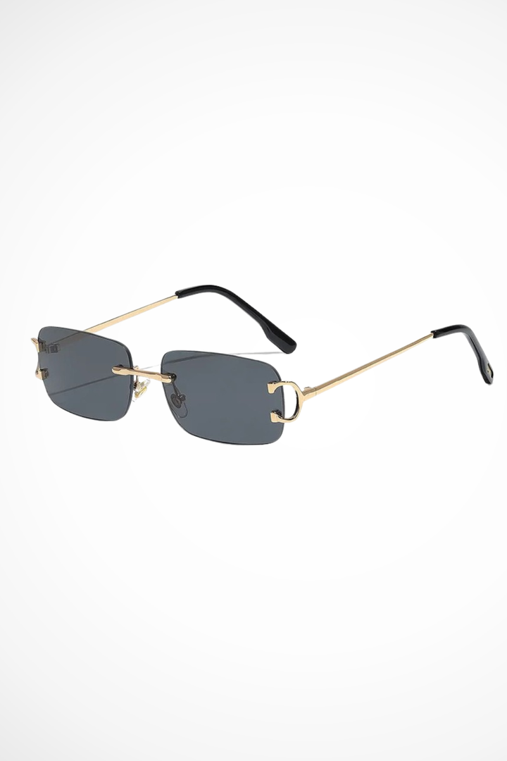 Elegant women's rimless rectangle sunglasses, boasting tinted lenses & a stylish gold frame for a chic look.