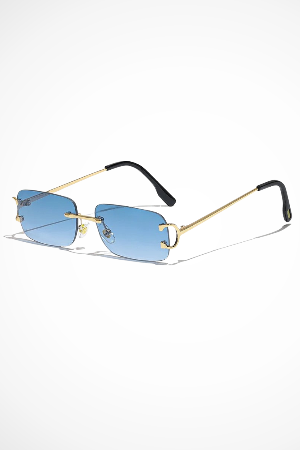 Trendy women's rimless rectangle sunglasses. Tinted lenses & a bold gold frame for a chic modern look.