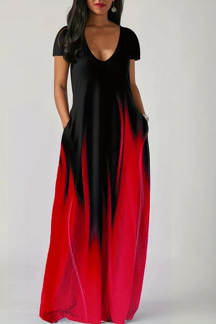 Side view of women's elegant ombre maxi dress with V-neck & short sleeves, showcasing flowy silhouette.