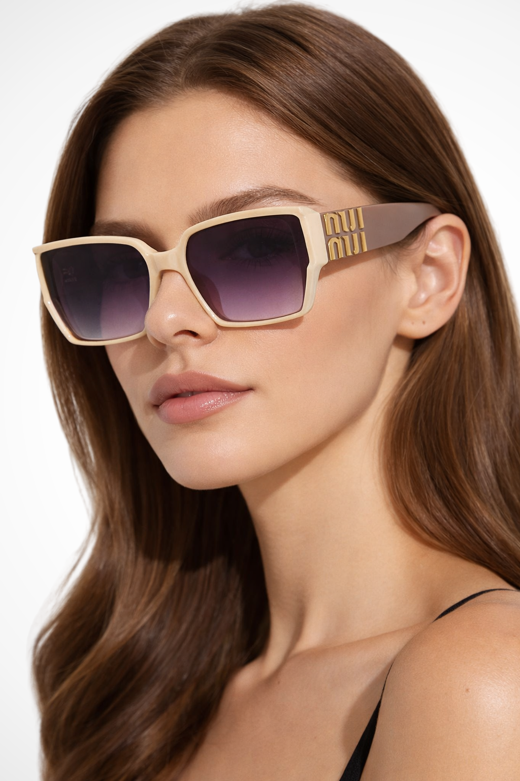 Modern oversized square women's sunglasses with gold accent on the frame. Stylish eyewear accessory.