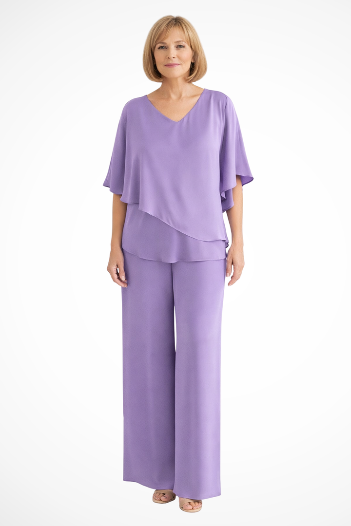 Spring fashion women's matching outfit: an elegant top and wide leg pants set for casual wear.
