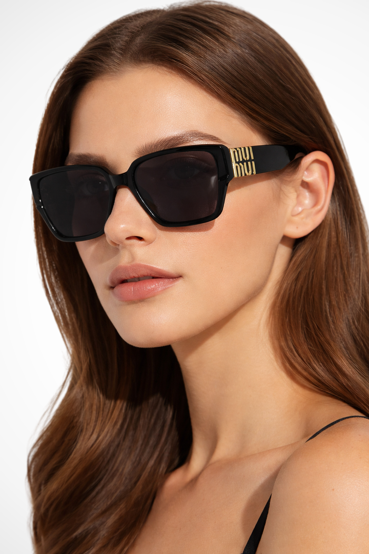Women's oversized square black sunglasses with elegant gold detail. Stylish fashion eyewear.