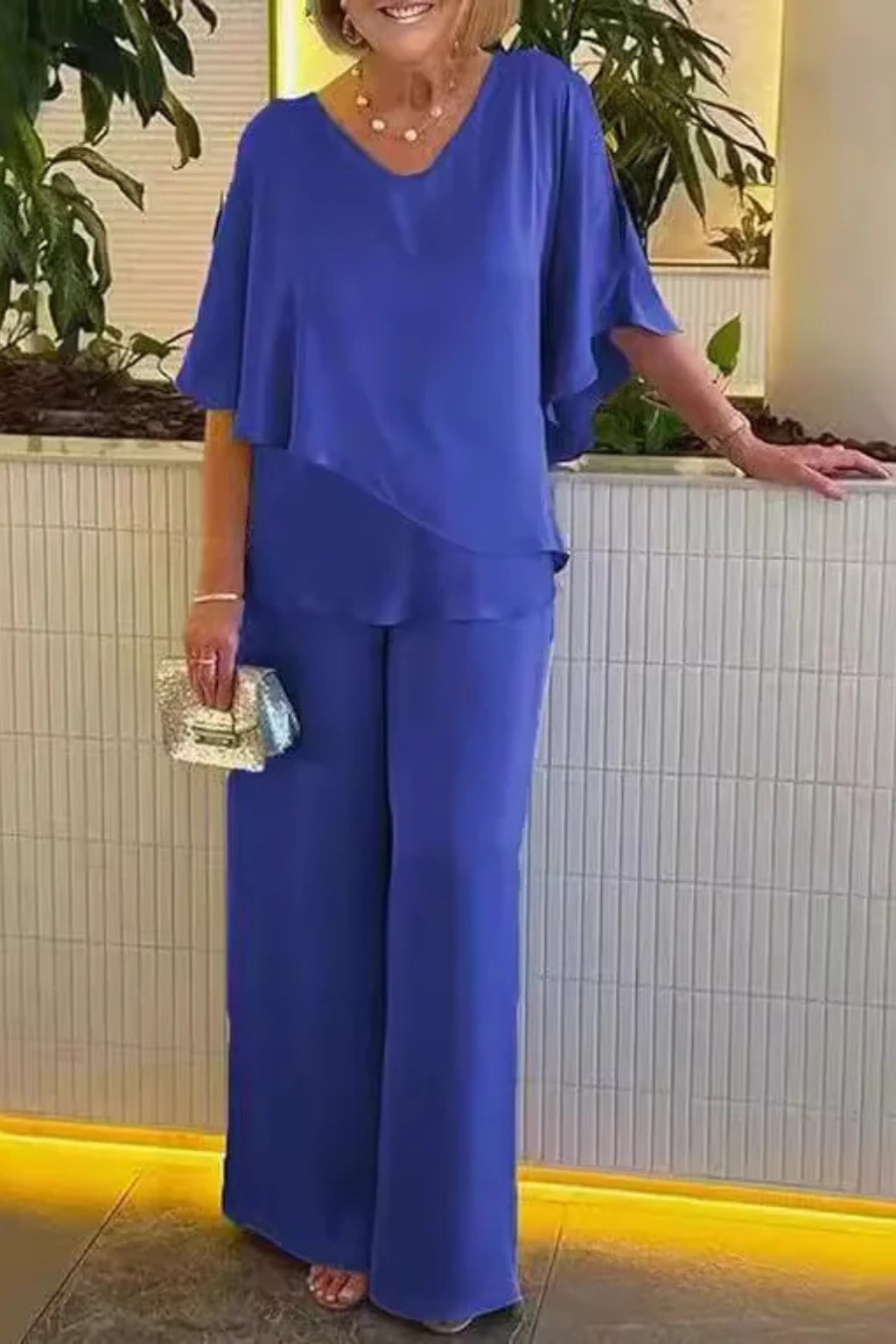 Elegant two-piece set for women with a chic top & flowy wide leg pants, suitable for loungewear.