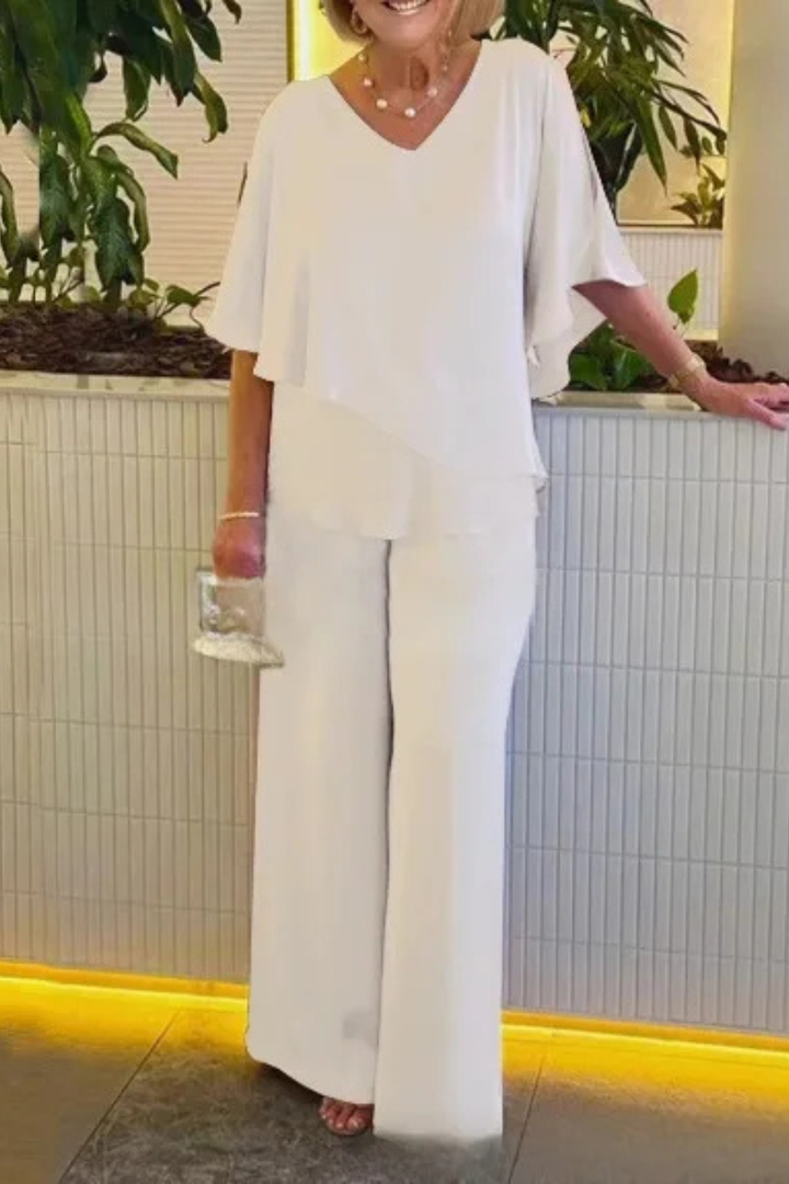 Casual yet elegant women's two-piece set with a comfy top & versatile wide leg pants.