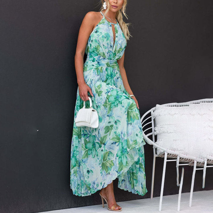 Women's elegant floral maxi dress, ideal for beachwear, parties, or casual summer chic. Vibrant green print.
