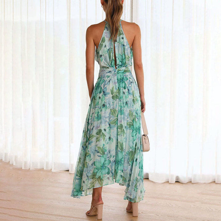 Comfortable green floral breeze maxi dress for women. Effortless summer style, flowy & elegant for any event.