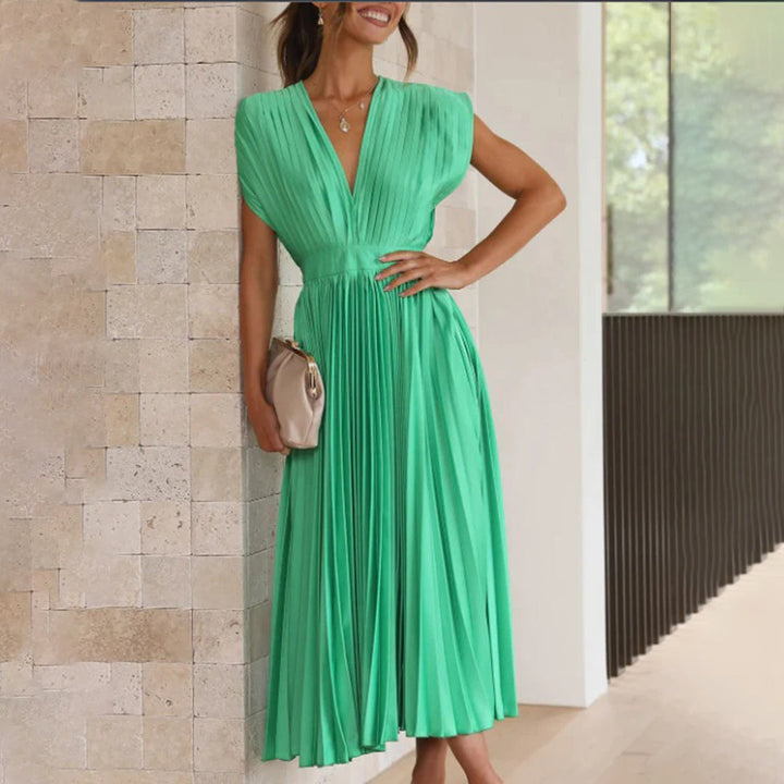 Women's casual flowy midi dress, perfect for relaxed summer elegance or a chic date night.