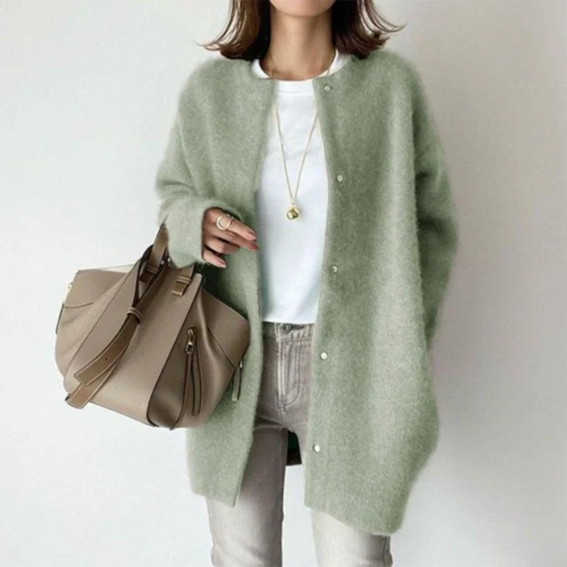 Stylish women's elegant knitwear cardigan. Cozy long sleeve layering piece for versatile fashion.