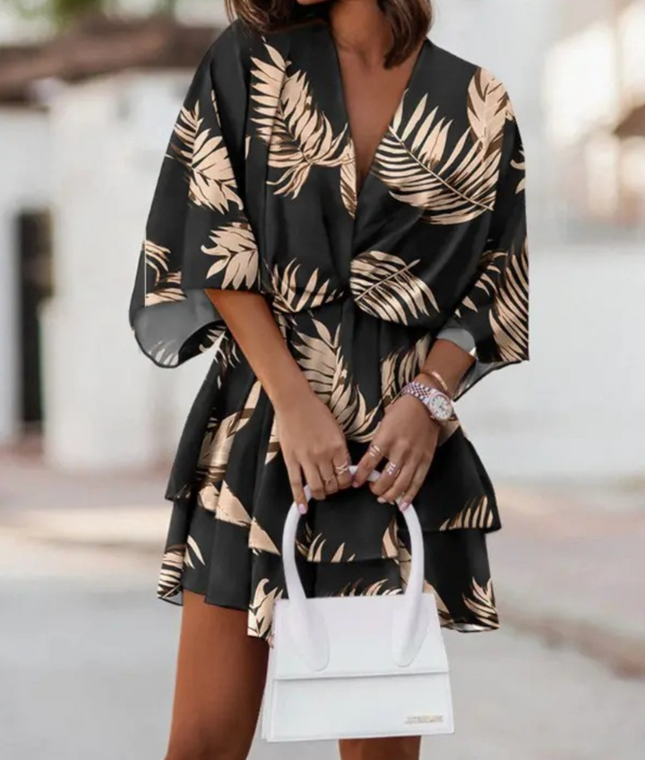 Casual women's floral mini dress in bohemian style, perfect for summer fashion and holiday outfits.