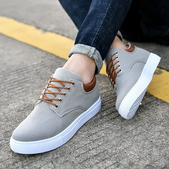 Versatile men's footwear, low-top lace-up design for casual wear, superior cushioning.