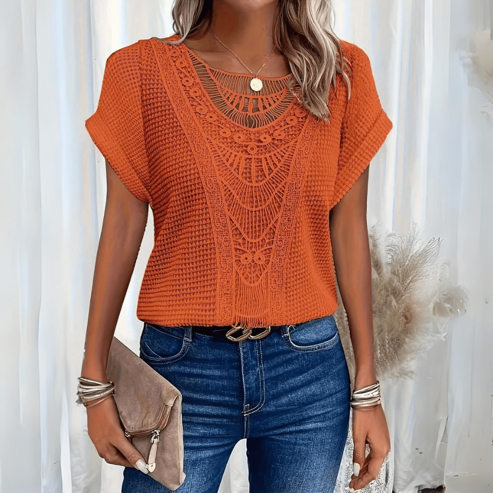 Flowy women's boho chic top, elegant and breezy, featuring an Ibiza style design, perfect for summer fashion.