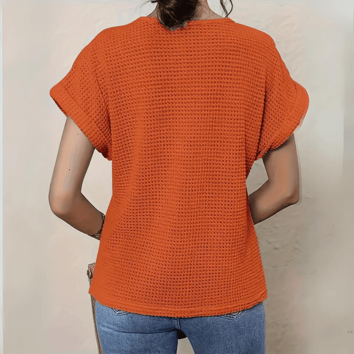 Elegant women's sleeveless top, boho chic and breezy. This Ibiza style tunic offers a relaxed fit for summer.