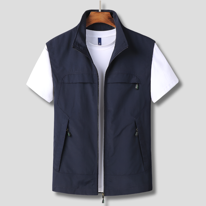 Men's quick-dry utility vest with multiple pockets, ideal for hiking, fishing, or travel. Breathable active wear.