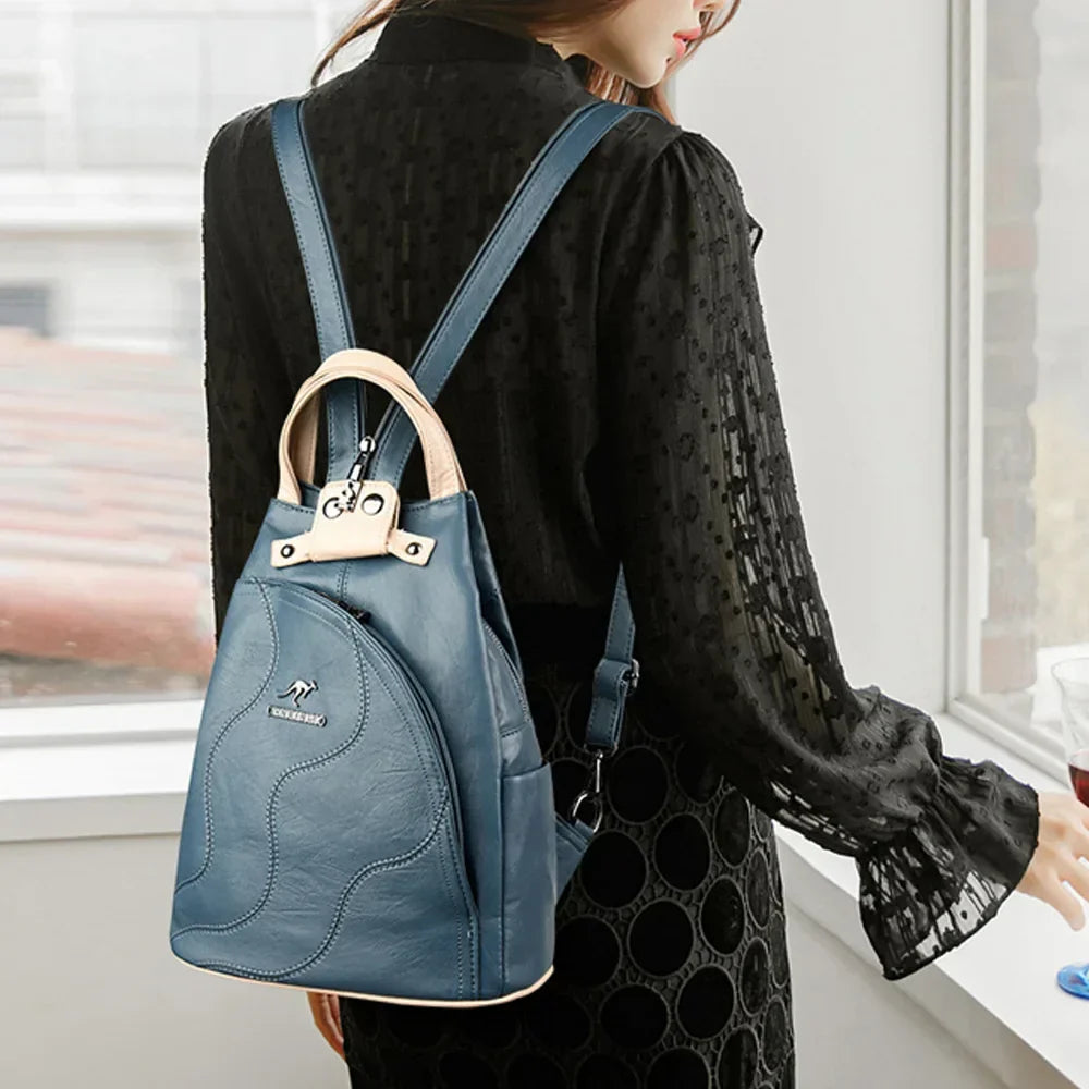 Women's anti-theft leather backpack with secure zipper, perfect for daily use & travel.
