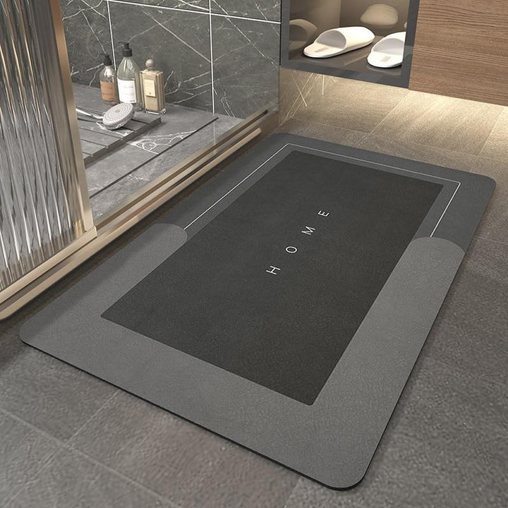 Oval quick-drying bath mat; super absorbent, non-slip, perfect for modern bathroom decor.