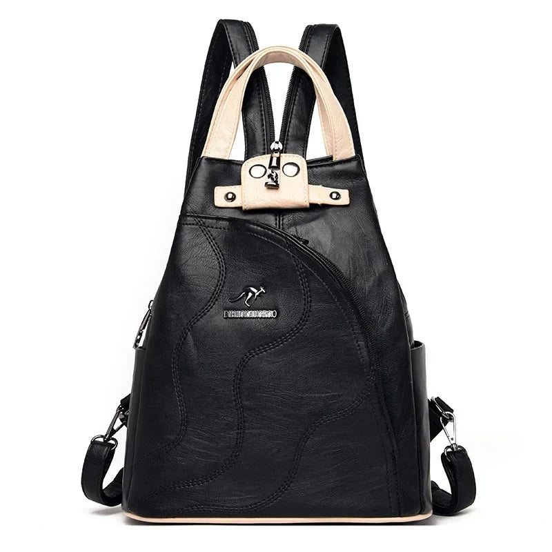 Women's anti-theft leather backpack showcasing a secure rear-access zipper, ideal for stylish, safe travel.