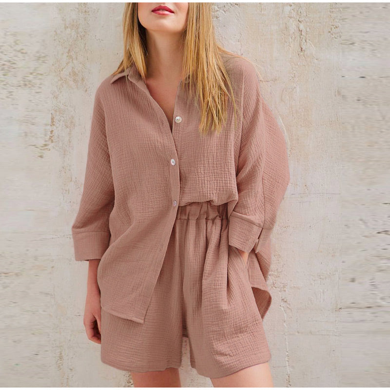 Woman models a comfortable linen two-piece summer set, perfect for vacation or casual elegance.