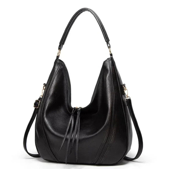 Elegant women's brown vintage leather shoulder bag, featuring sturdy brass hardware & a secure flap closure.