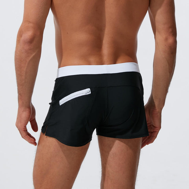 Dynamic shot of men's modern swim trunks with comfort waistband, quick-dry feature.